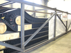 germanWell® - Corrugated Sidewall Conveyor Belt in transport steel cradle